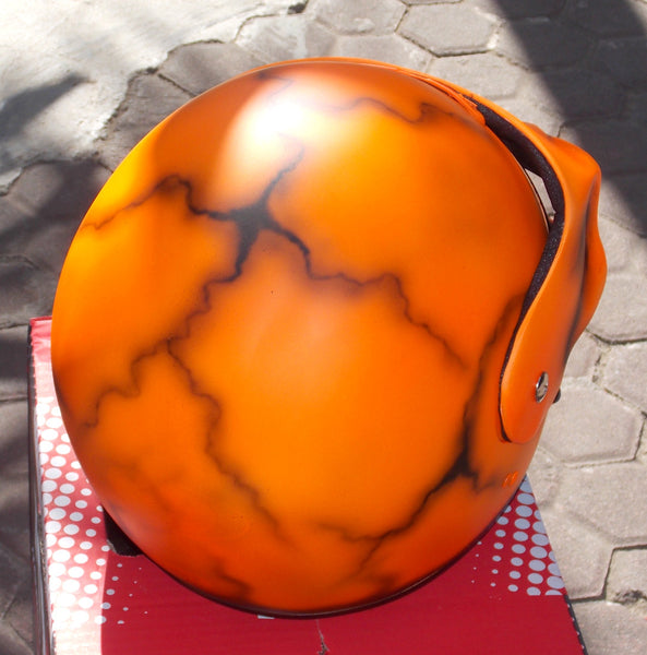 Helmet with Skull Visor in a bright Orange Helmet with Skull Visor in a bright Orange