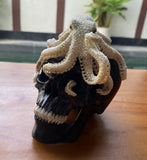 Black Wood Carved Human Skull Sculpture with Octopus Carving made from Antler