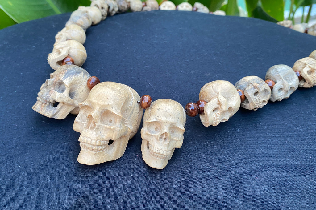 19'' Long Natural Wood Carved Skull Pendant Necklace with 29 carved mini skulls