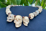 19'' Long Natural Wood Carved Skull Pendant Necklace with 29 carved mini skulls