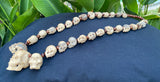 19'' Long Natural Wood Carved Skull Pendant Necklace with 29 carved mini skulls