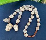 19'' Long Natural Wood Carved Skull Pendant Necklace with 29 carved mini skulls
